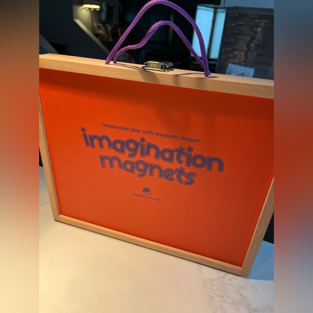MindWare imagination magnet set in cute wooden case. Easy travel and storage.
